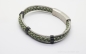 Preview: Lederarmband geflochten in grün mit Edelstahl Verzierungen